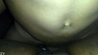 Ebony takes big cock on sofa