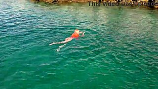 i spotted a skinny naked girl flashing her shaved small tits by the blue water outdoors