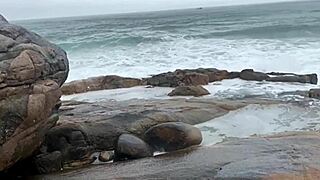 Latina with big tits gets creampied on the beach during orgy