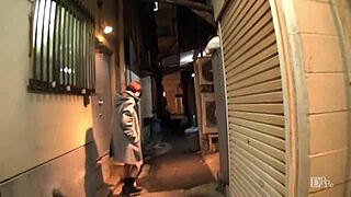 Skipping walk with remote vibrator in night alley
