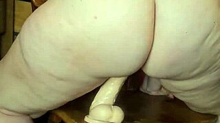 Milf goes wild squirting while riding a thick dildo with toys