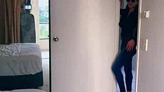 Pretty Asian ladyboy performs jeans striptease revealing gifted big boobs and ass