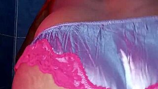 I model satin panties while dancing