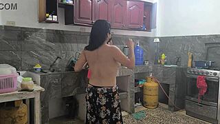 Housewives prepare lunch and touch each other sensually