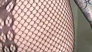 Paige in fishnets takes big black cock dildo in her ass and finishes with mouth.