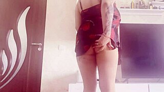 Hot blonde teases with big tits in sexy dress