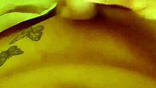 Tattooed cute ladyboy jerks small cock