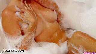 delightful young brunette model bathes adorably