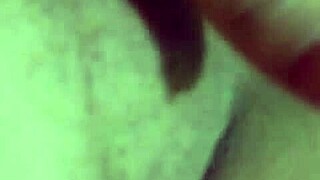 Mature woman masturbates shaved pussy alone at home