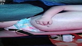 Baby pup gets padded up in a detailed diaper promo session