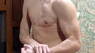 Skinny boy flexes intensely in underwear
