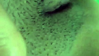 Mature woman masturbates shaved pussy alone at home