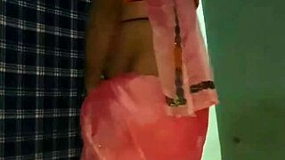 A shemale performs a hot mujra dance in a saree