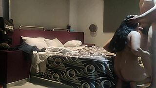 Double camera action in a steamy hotel room setup.