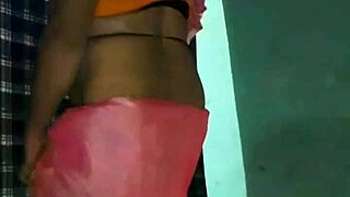 A shemale performs a hot mujra dance in a saree