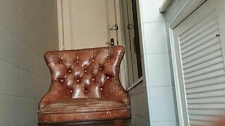 big dick guy masturbates in bathroom armchair