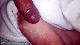 CUMSHOT Lands On OILED Feet In This Scene