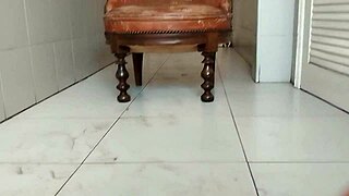big dick guy masturbates in bathroom armchair