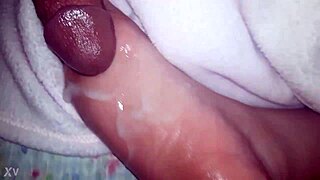 CUMSHOT Lands On OILED Feet In This Scene