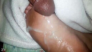 CUMSHOT Lands On OILED Feet In This Scene