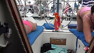 Picked up two asian bikini babes for outdoor boat fucking