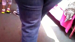 Milf in jeans shows off big ass on street