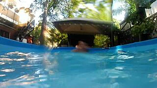 hey, melissa the mermaid with her tattoo and brown eyes is chilling by the pool today