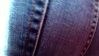 Milf in jeans shows off big ass on street