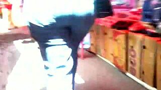 Milf in jeans shows off big ass on street