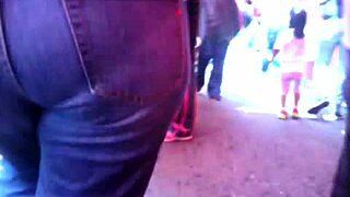Milf in jeans shows off big ass on street