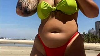 I think that married woman is drawing attention on the beach with her tucked bikini