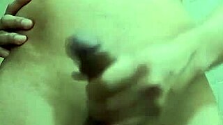 skinny guy with monster cock jerks off solo in the work bathroom, showing his small waist and big tool