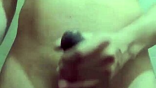 skinny guy with monster cock jerks off solo in the work bathroom, showing his small waist and big tool