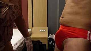 Dominant bitch slaps and kicks erect cock over tight blue bloomers for fun