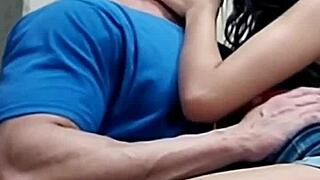 Young Girl Kisses Muscular Guy