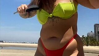 I think that married woman is drawing attention on the beach with her tucked bikini