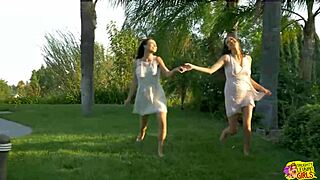 Two naughty lesbians intensely kiss and eat pussies outdoors