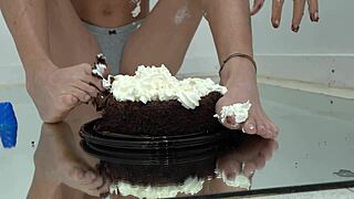 Giggles feet rub giant hot rock at beach on beat2feetcom