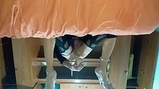 Latina shemale inserts new toy into her ass.