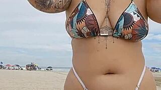 Flashing tiny panties on the beach to attract married guys for hot african fun