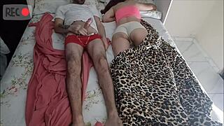 Why did the mature guy lie to make the young neighbor share his bed for handjob?