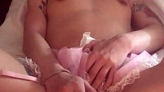 Oh man, this dirty young girl is masturbating solo with her natural tits out