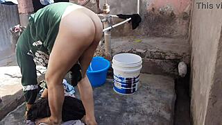 Look at this sexy big boobs bhabhi bathing outdoors?