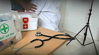 Doctor performs secret blowjob on patient in clinic setting.