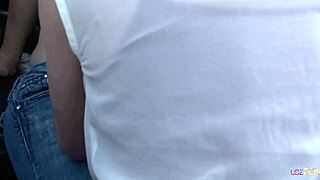 A stunning lesbian blonde in heels is comforting another sex depraved stunner with pussy licking in the parking lot.