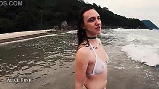 Alice Kink boldly strips off her micro bikini at the public beach, flashing naked skinny body in see-through exhibitionist style from Brazil