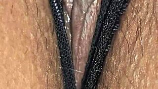 latina wife in black panties takes cumshot on hairy beaver and big ass.
