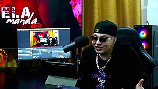 Binho Ted licks the pink pussy of the young girl on the podcast table while Ruan watches silently