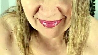 Stepmom strips for stepson gives blowjob and takes cumshot on huge natural tits