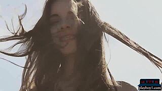 Petite Russian centerfold Kate Chromia strips outdoor in bikini, revealing hairy beaver